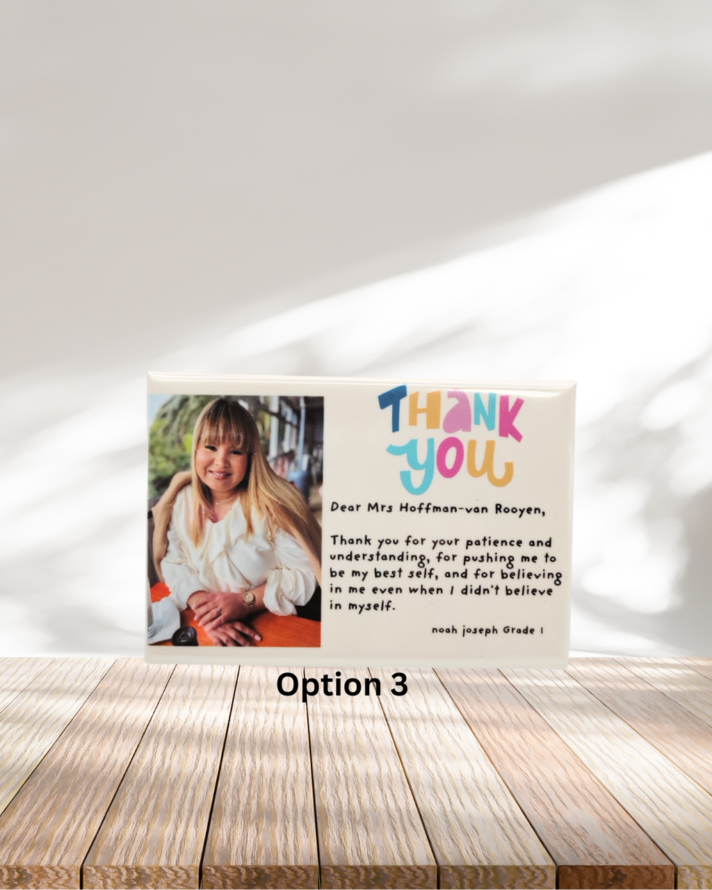 Personalised thank you card with a photo of a woman on a wooden surface.