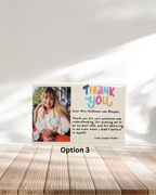 Personalised thank you card with a photo of a woman on a wooden surface.
